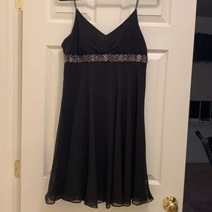 Chiffon empire waist dress with beading.